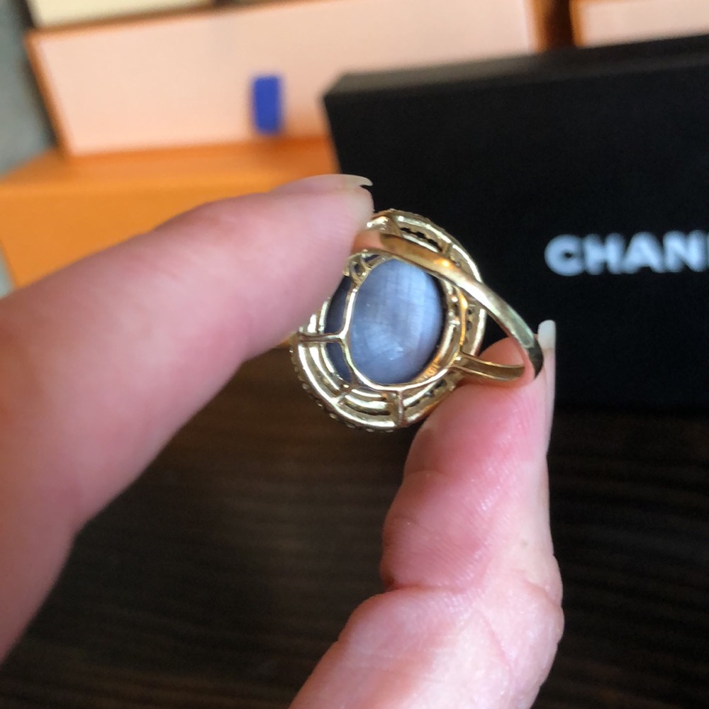 19 ct Star Sapphire surrounded by Diamonds in gold - Picture 6 of 15